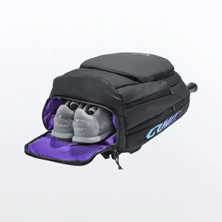 The Head Gravity Backpack for sale at GSM Sports with Tennis Shoes inside it for illustrative purposes