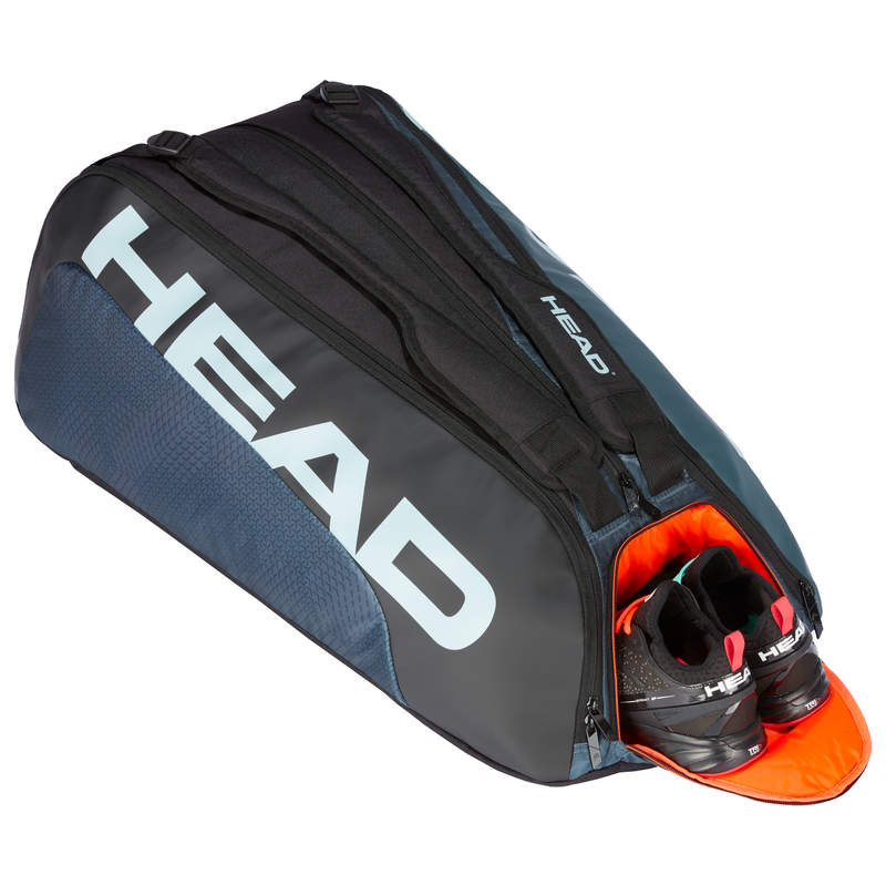 The Head Tour Team Monstercombi which holds 12 tennis rackets which is for sale at GSM Sports with tennis shoes inside for illustrative purposes