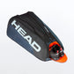 Head Tour Team Monstercombi Tennis Bag which holds 12 tennis rackets is for sale at GSM Sports in black with shoes inside for illustrative purposes