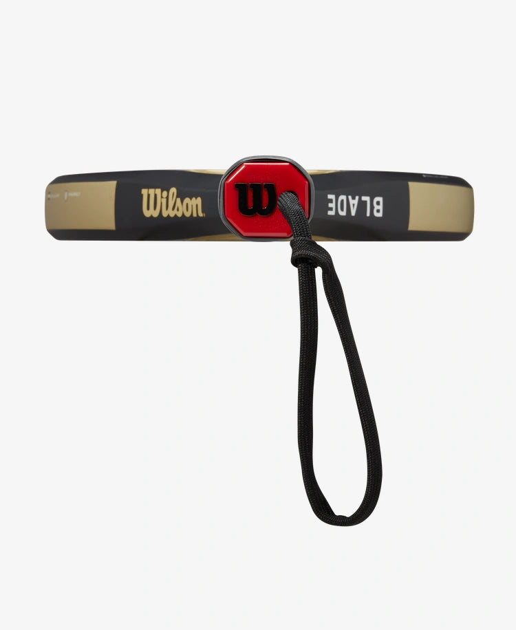      WR067221U__6432ef84d56341638e558c779f31358d 1556 × 1900px The Wilson Blade Pro V2 Padel Racket in gold colour which is available for sale at GSM Sports.