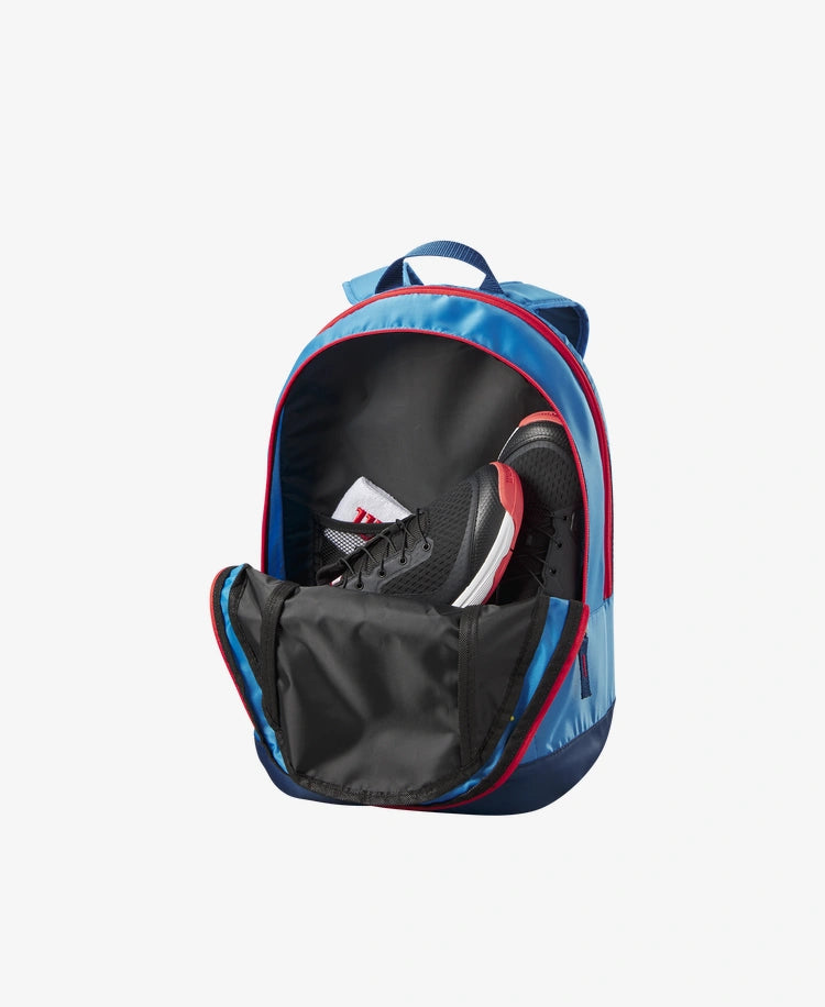 The Wilson Junior Backpack in blue and orange colour which is available for sale at GSM Sports.