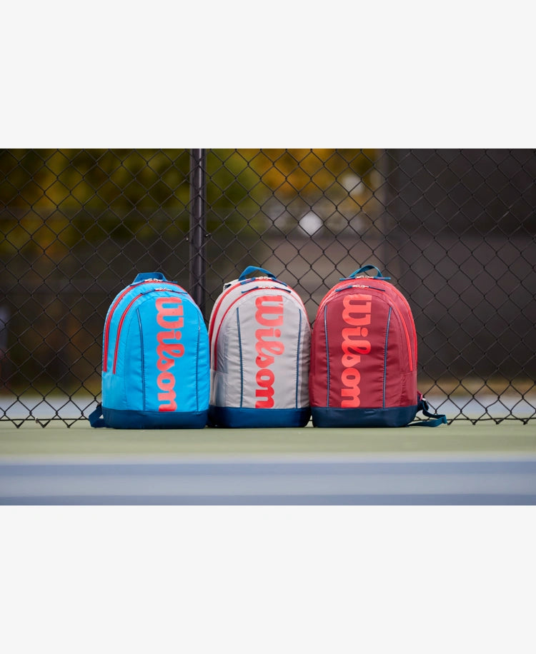 The Wilson Junior Backpack in blue and orange colour which is available for sale at GSM Sports.