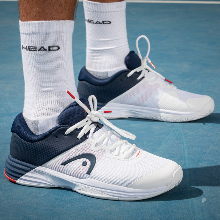 The Head Revolt Evo 2.0 Mens Tennis Shoe in White and dress blue colour which are available for sale at GSM Sports.