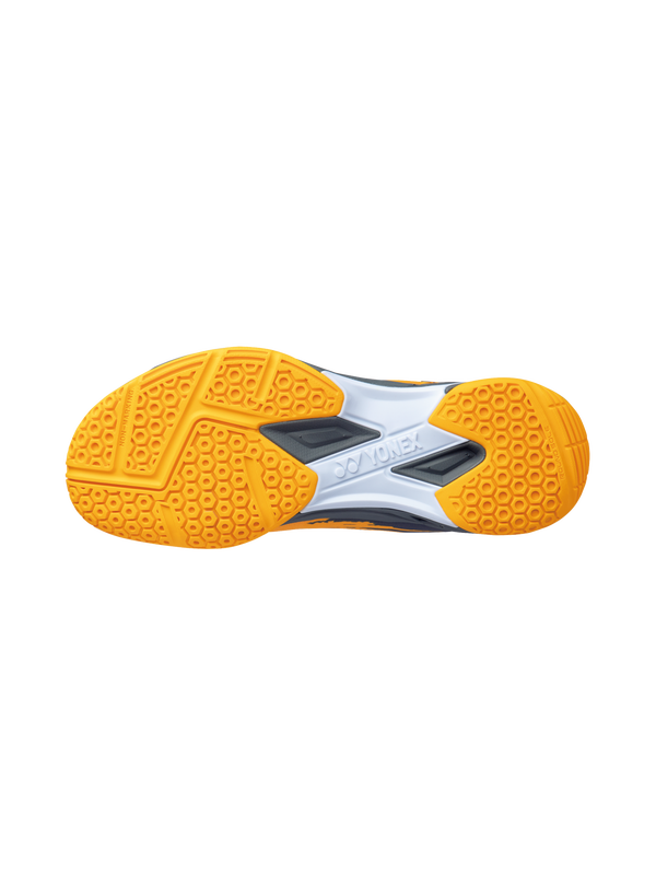 The Yonex Power Cushion Cascade Drive Unisex Badminton Shoes in yellow and graphite colour which are available for sale at GSM Sports.