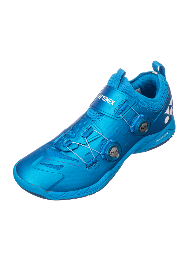 The Yonex Power Cushion Infinity Unisex Badminton Shoes in metallic blue which are available for sale at GSM Sports.    