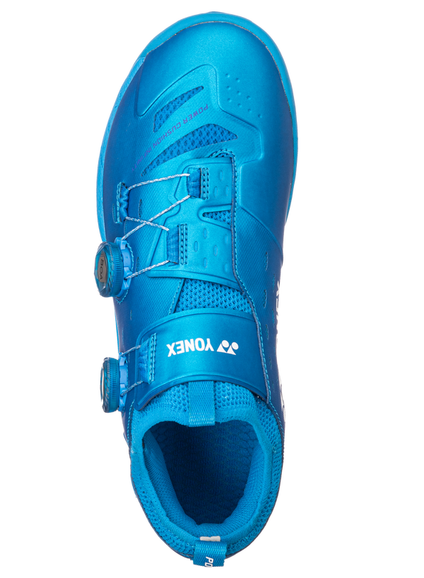 The Yonex Power Cushion Infinity Unisex Badminton Shoes in metallic blue which are available for sale at GSM Sports.